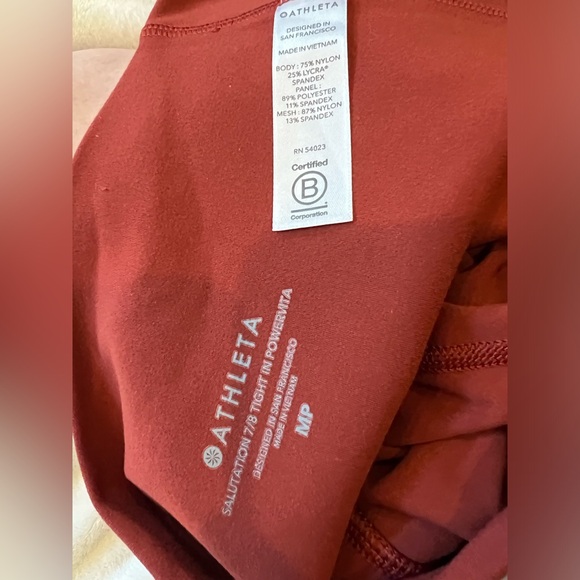 Athleta SALUTATION STASH POCKET II TWIST 7/8 TIGHT Leggings ~ size medium petite - Picture 4 of 4